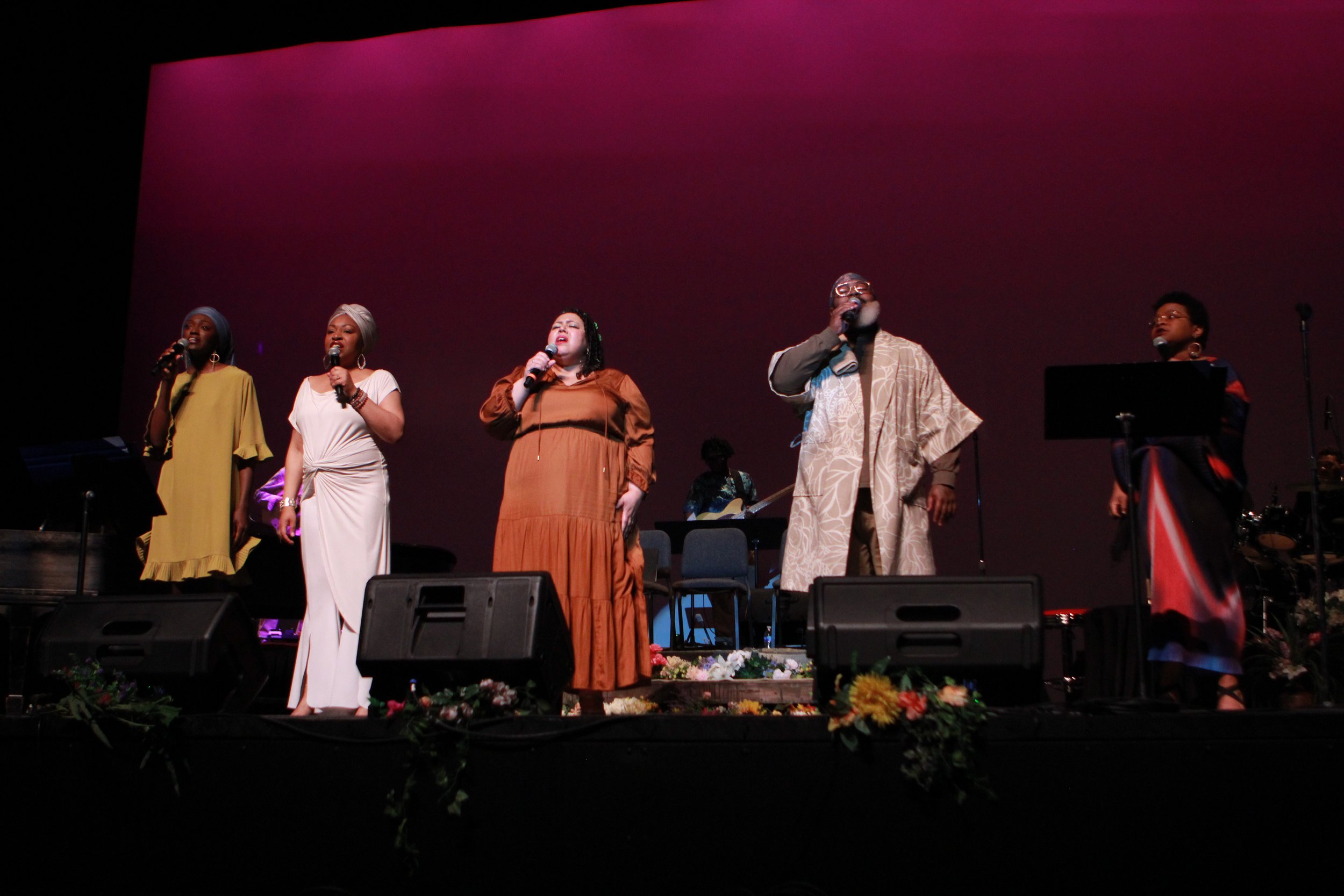 Engaged and diverse audience members applauding at a performance