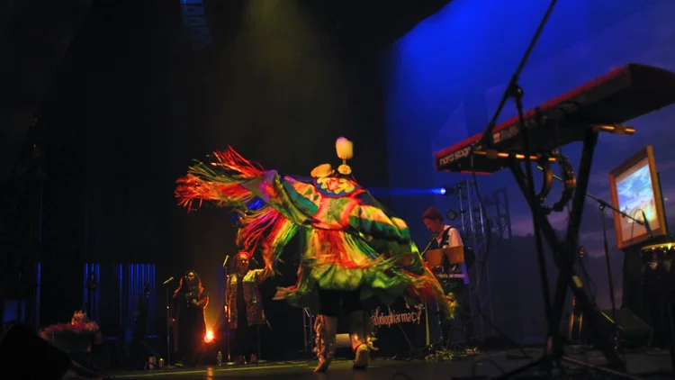 Dynamic dance performance with artistic choreography and stage lighting