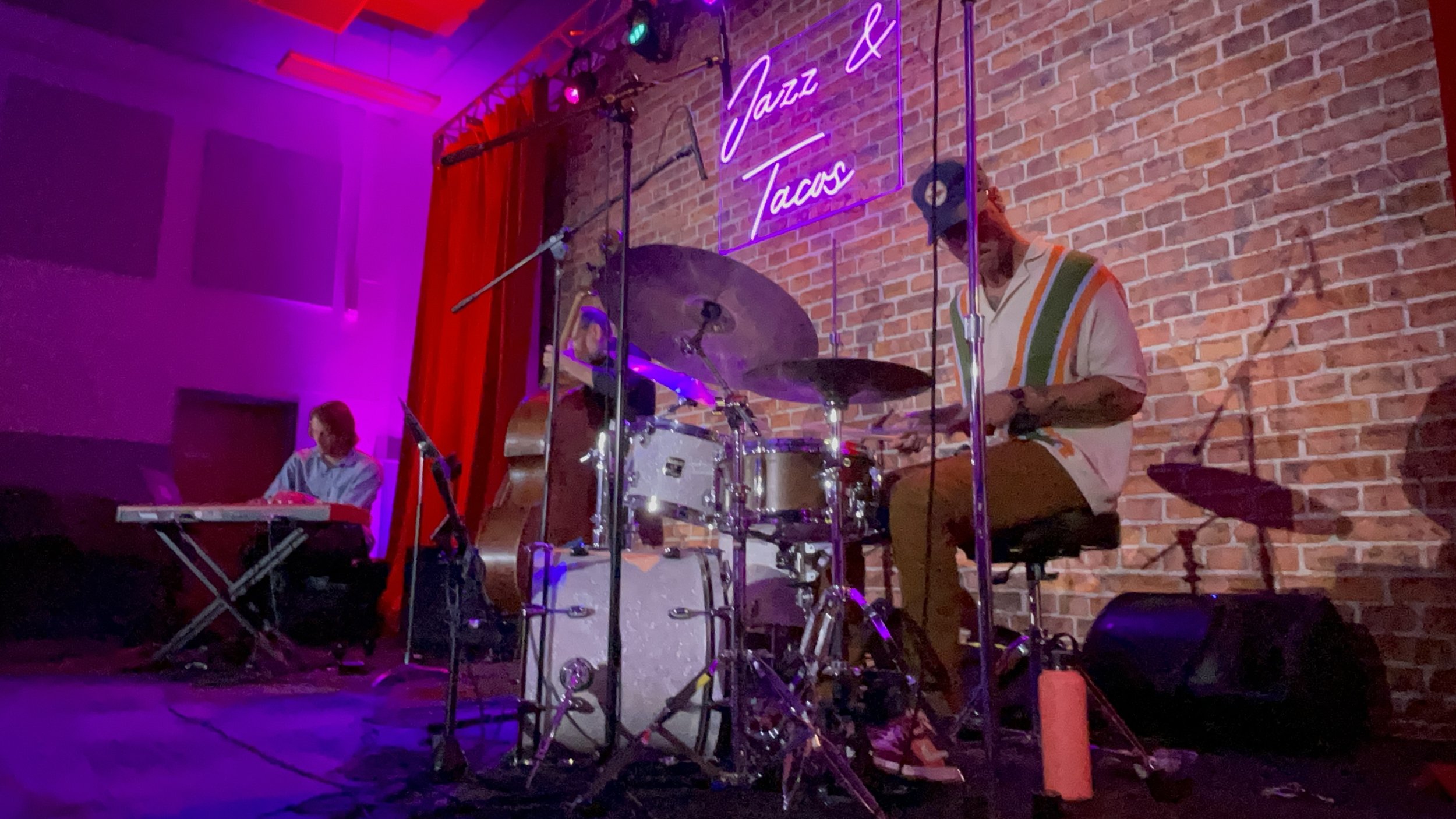 Jazz performance on stage with warm lighting and engaged audience